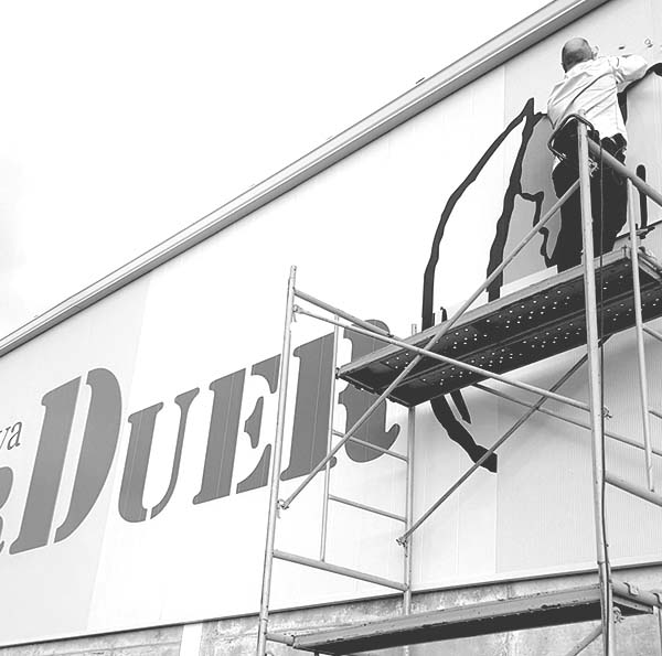Alzado Rótulos Rotulación de naves comerciales para empreas y comercios. Rótulos luminosos y letras corpóreas. Carteles y vinilos.